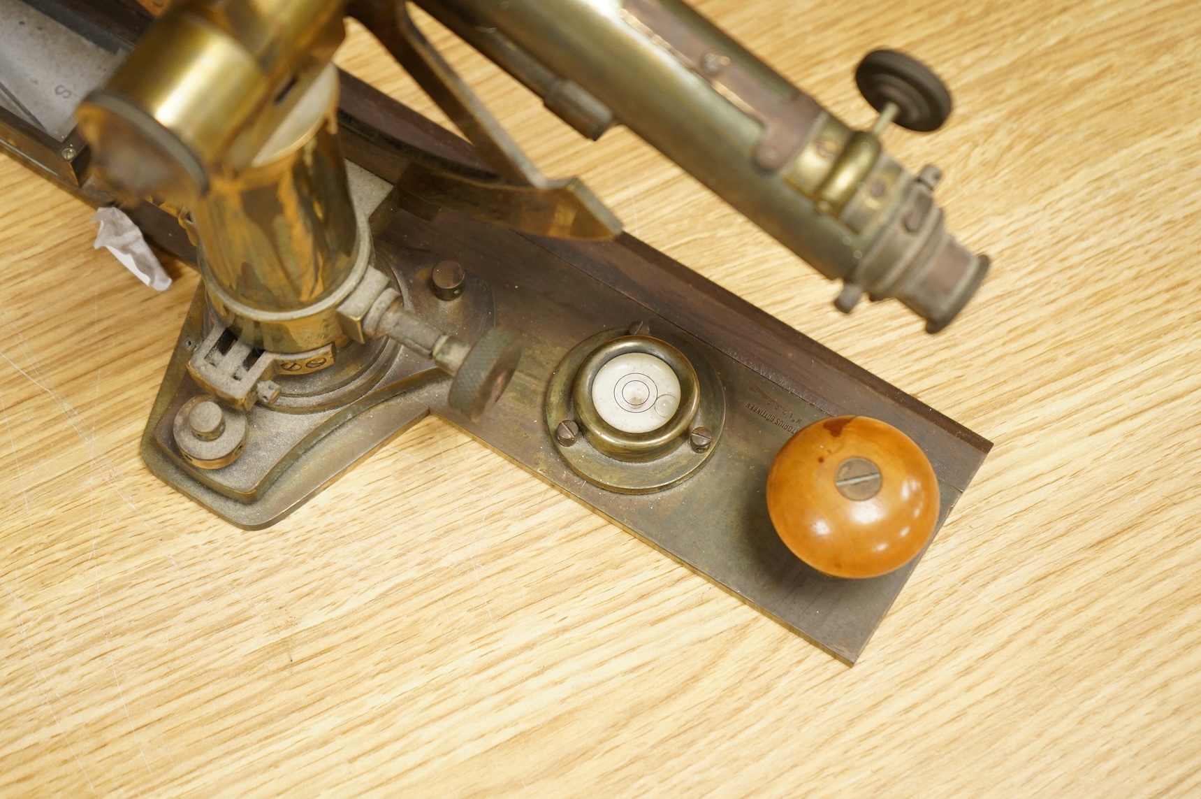 A German brass alidade by F. Sartorius, Göttingen, number 1755, 58.5cm wide, contained within a fitted birch case with applied maker’s label and other reference markings, the case; 63cm wide, 14cm high, 25cm deep at the